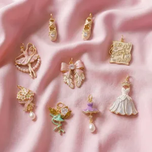 Detailed view of pink ballet-themed copper pendants for DIY necklaces and jewelry
