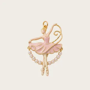 Close-up of elegant pink ballerina dancer pendant with pearls for DIY necklaces.