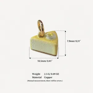 Detail view of miniature cake slice pendant showing dimensions and copper material specs.