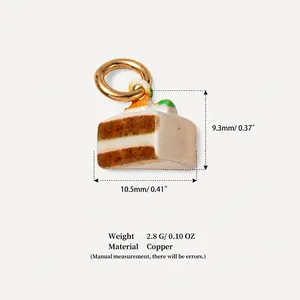 Detailed macro shot of a miniature copper cake slice charm showing size and weight specs