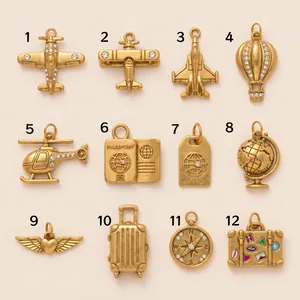 Set of 12 gold-plated travel charms featuring airplane suitcase and compass for DIY jewelry
