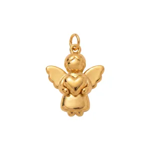 Detailed macro view of a 18K gold plated stainless steel angel pendant holding a heart.