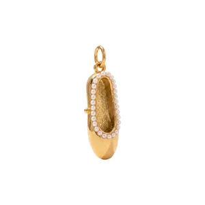Close-up view of 18K gold plated stainless steel ballet shoe pendant with pearl trim detail