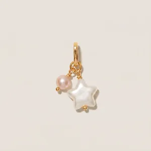 Close-up of 18K gold plated titanium steel pendant with star pearl and pink pearl.