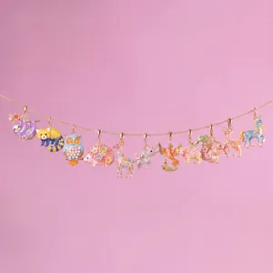 Detailed view of colorful enamel animal charms on a gold-plated stainless steel chain.