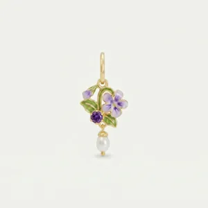 Macro detail of elegant floral enamel pendant with purple gemstone and teardrop pearl