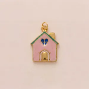 Close-up detail of a pink house-shaped titanium steel pendant with a blue heart window