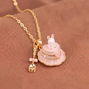Detailed macro view of a cute pink heart cake locket necklace with a white rabbit