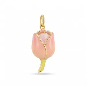 Close-up of elegant pink enamel flower bud pendant with gold-plated metal accents.