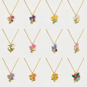 Grid view showing twelve distinct enamel birth flower pendants on delicate gold chains.