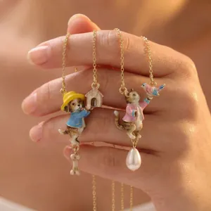 Exquisite fairy tale style enamel pet necklaces featuring dog and cat charms with pearls