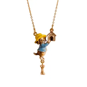 Whimsical enamel dog necklace with yellow hat blue coat doghouse and bone charm