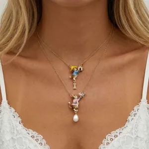 Fairy tale style enamel pet necklaces featuring cute cat and dog pendants with pearls.