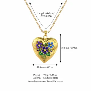 Gold heart locket necklace with floral enamel pattern and detailed product size dimensions