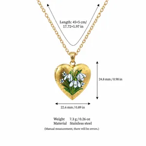 Detail view of floral heart locket necklace with dimension specifications.