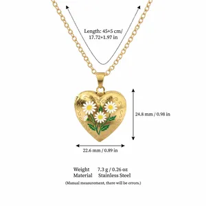Close-up of stainless steel heart locket necklace with daisy flower and size dimensions