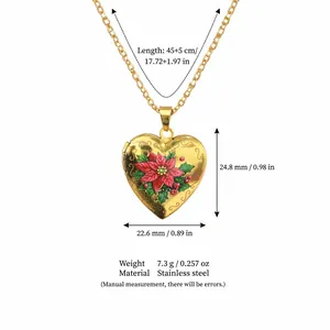 Close-up showing dimensions of gold heart locket necklace with red poinsettia flower