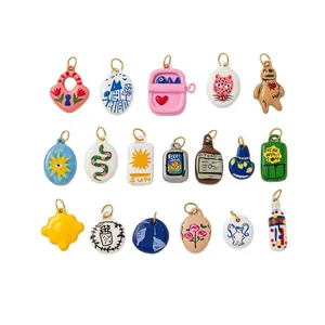 Colección de dijes DIY de acero inoxidable pintados a mano para hacer joyas.