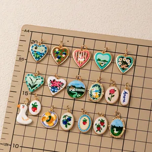Pastoral enamel charms set with duck strawberry and floral designs in 18K gold plating