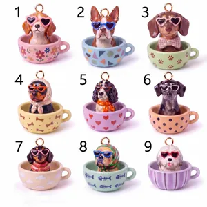 Collezione di nove ciondoli in smalto con cani in tazza per la creazione di gioielli fai da te