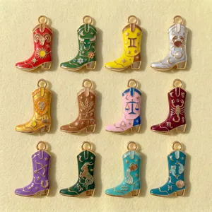 Detailed close-up view of twelve colorful zodiac cowboy boot enamel charms with gold-plated trim