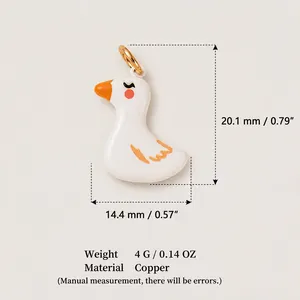 Detailed view of white enamel duck charm pendant showing size and weight specifications