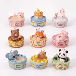 Detailed view of nine cute animal charms in mini bath tub shapes for DIY jewelry making.