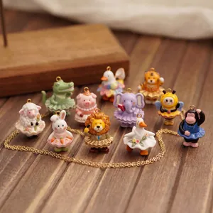 Collection féerique de pendentifs animaux ballerines avec chaîne dorée élégante