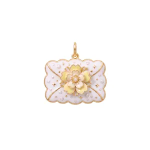 Close-up of elegant French style envelope pendant with 3D yellow flower and pearls