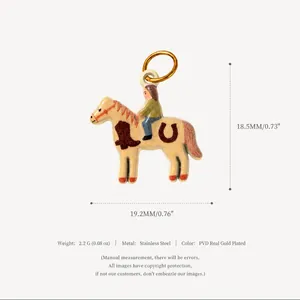 Detailed macro view showing a horse charm pendant made from 18K gold plated stainless steel