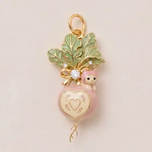 Detailed view of a luxury enamel radish pendant featuring a pink cat and bow