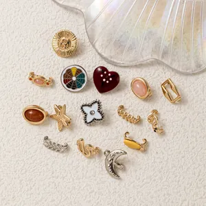Collection of colorful enamel shoe charms with various fashion shapes and designs.