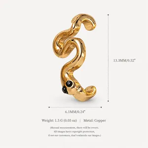 Detailed view of irregular gold S-shaped charm with dimensions and material specs
