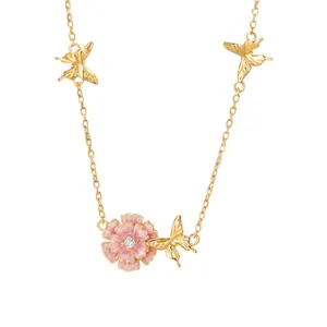 Elegant gold copper birth flower necklace with pink enamel petals and butterfly charms