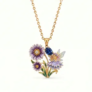 Detailed view of gold necklace featuring enamel flower fairy pendant with blue gemstone