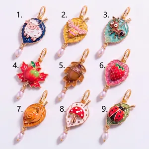 Colorful enamel leaf pendants with pearl drops featuring cute 3D animal and fruit designs