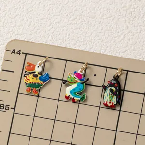 Hand-painted colorful enamel animal charms for DIY jewelry making featuring duck and penguin