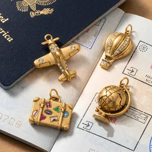 18K gold plated stainless steel travel charms set with airplane and suitcase