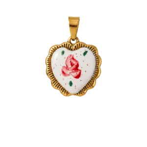 Vintage style heart shaped pendant with enamel rose and 18K gold plated scalloped edge