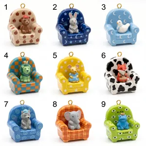Detailed collection of nine colorful miniature animal charms on miniature armchairs