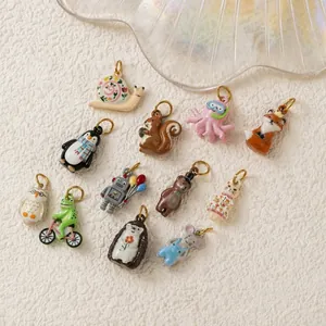 Detailed view of colorful animal and character charms for DIY jewelry making crafts