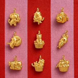 Detailed view of nine gold-toned 3D cute cat and rabbit pendants in various poses.