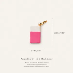 Detail view of pink and white stationery book pendant with dimensions and weight info