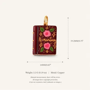 Detailed copper book charm pendant with measurement labels and weight information
