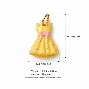 Detail view of yellow floral dress charm showing dimensions 16mm x 12.8mm and copper material.