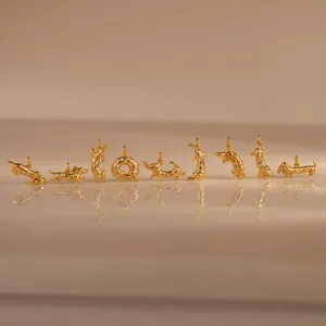 Collection of gold-plated dachshund charms with zirconia for DIY jewelry making