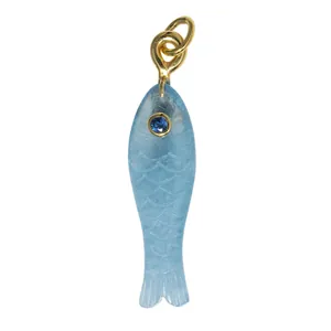 Detailed view of light blue fish pendant with carved scales and blue gemstone eye