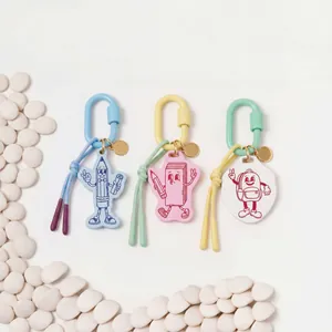 Set di tre ciondoli per borsa in acrilico colorato con personaggi dei cartoni animati