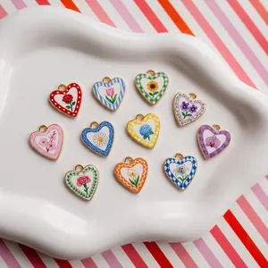 Detailed view of heart-shaped flower charms for DIY jewelry making accessories