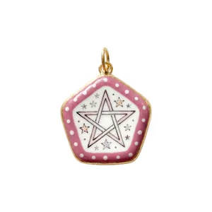 Detailed macro view showing the pink pentagonal charm with white stars and polka dot patterns